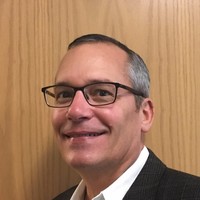 Judson Millhon, MD