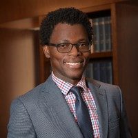 Dela Amoussou, MD