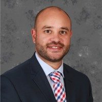 Travis Hanson, MD