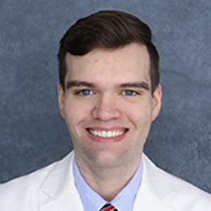 Travis Hallett, MD