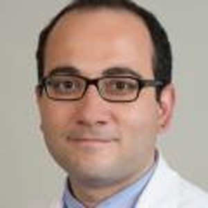 Olcay Aksoy, MD